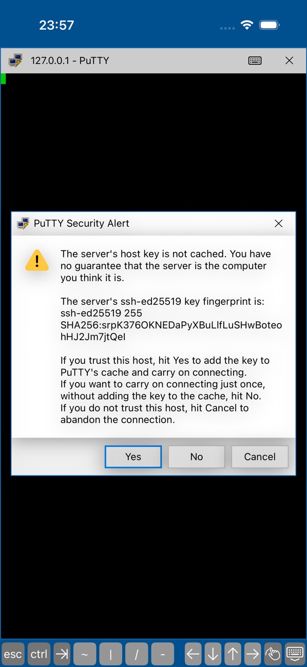 The PuTTY Security Alert with an ssh-ed25519 fingerprint and Yes, No and Cancel